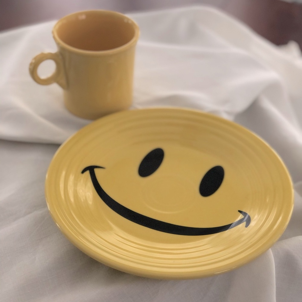 Fiesta Bright yellow coffee cup & smiley plate